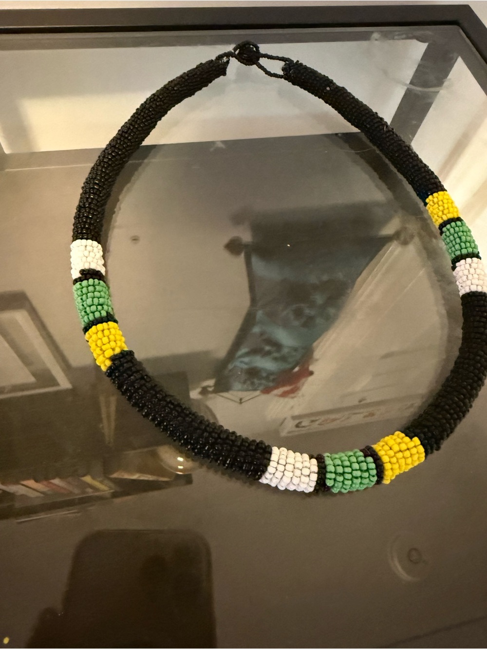 Handcrafted Black Beaded Necklace with Green, Yellow & White Accents